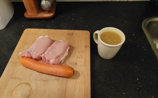The ingredients of our gravy: chicken, carrot and broth